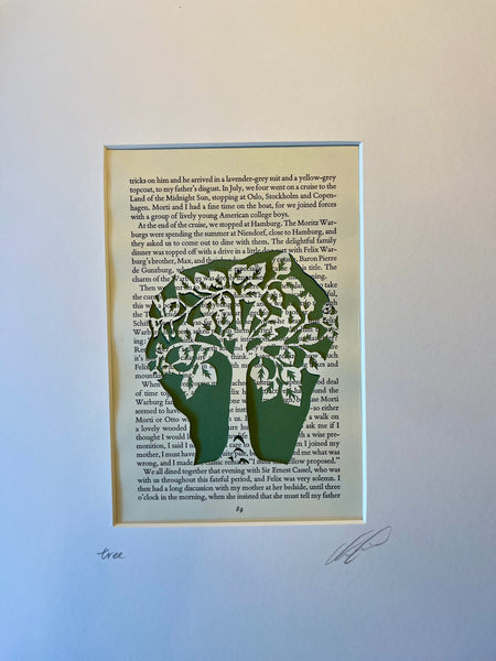 Tree — hand-cut paper art on vintage book page