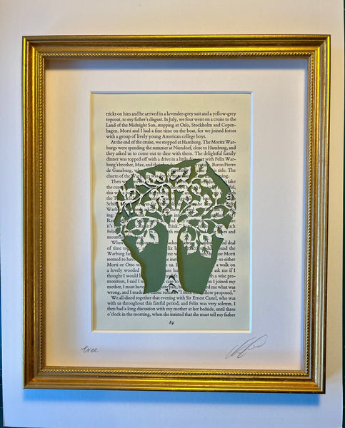 Tree — hand-cut paper art on vintage book page